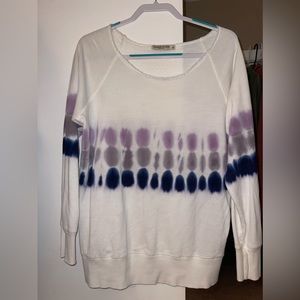 White off the shoulder sweatshirt with blue and purple tie-dye details